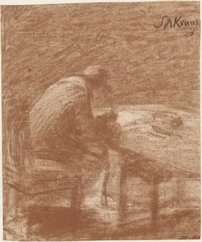 Schrijvende man aan een tafel