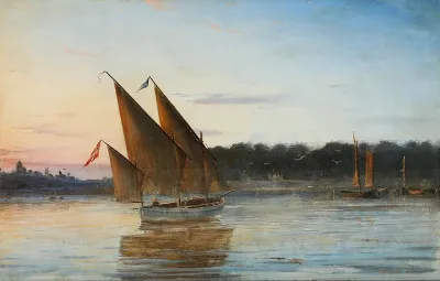 Seascape with sailing boats at sundown.