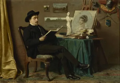 Seated man reading