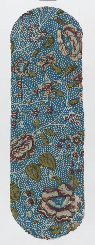 Sheet with an overall floral and dot pattern on blue background
