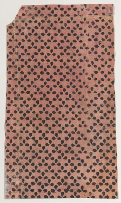 Sheet with overall pattern of dots in triangular shapes