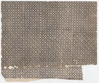 Sheet with overall pattern of flowers within squares