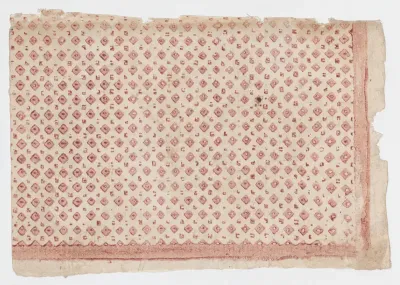 Sheet with overall pattern of squares and dots