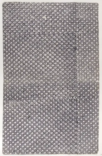 Sheet with overall pattern of triangles and dots