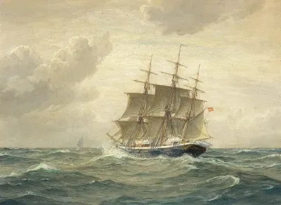 Ship with three masts at sea.