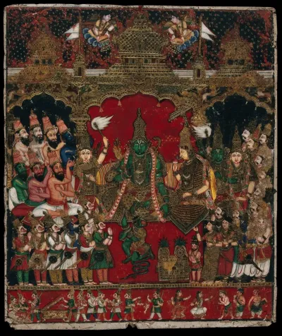 Shri Rama sitting with his wife Sita, and his devotee Hanuman holding his foot