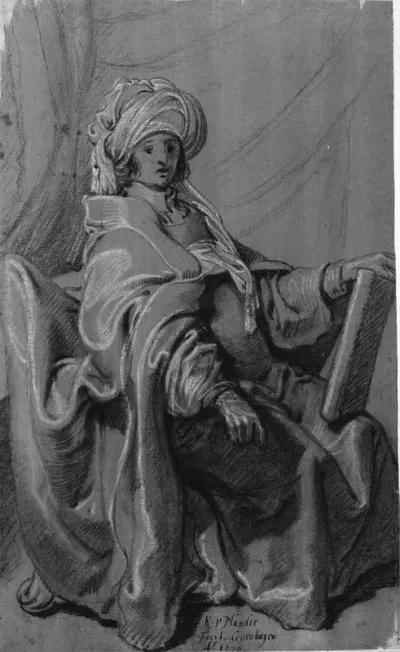 Siddende figur i kappe og turban, holdende en bog. Vendt mod højre.