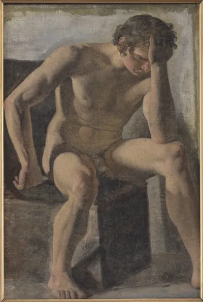 Siddende mandlig model