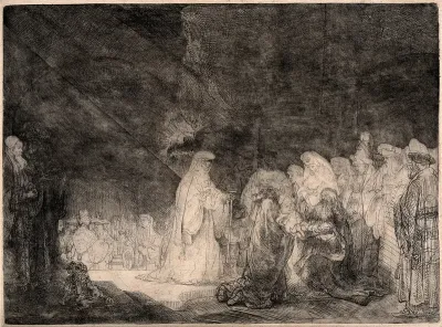 Simeon holds the infant Jesus in his arms