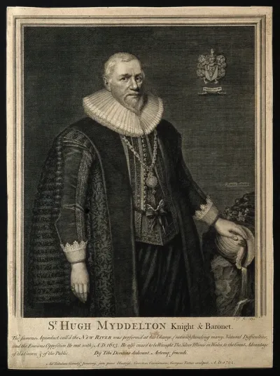 Sir Hugh Myddelton, his hand resting on a shell, from which flows water, set on a rock