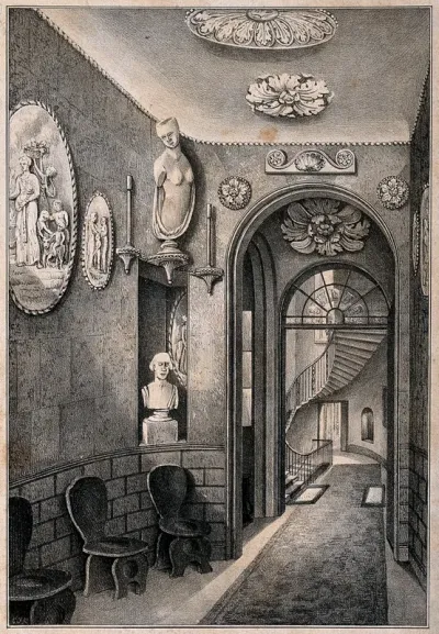 Sir John Soane's House and Museum: the hallway and stairs at ground floor level, showing the vestibule and chairs