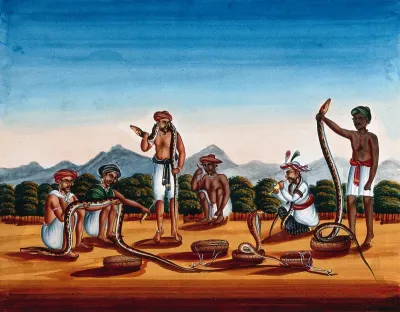 Six snake charmers displaying their snakes