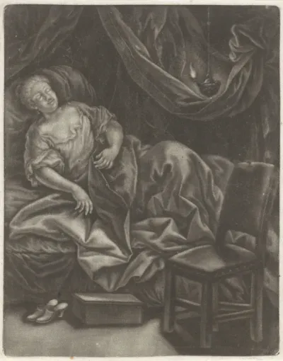 Slapende vrouw in bed