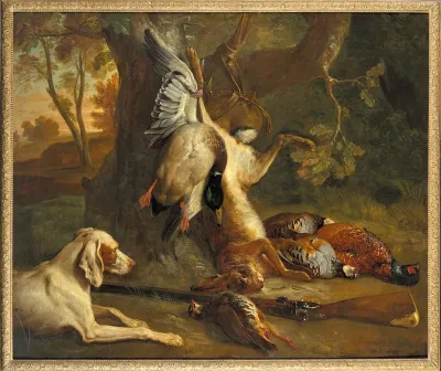 Spaniel in front of a hunting trophy