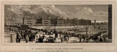 St. Thomas's Hospital, Lambeth: from the north bank of the river Thames, in front of New Scotland Yard, traffic on Westminster Bridge in the foreground. Wood engraving, 1871