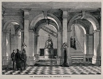 St Thomas's Hospital, Lambeth: the entrance hall, with a statue of Queen Victoria