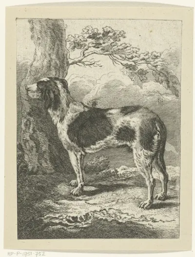 Staande hond bij boom