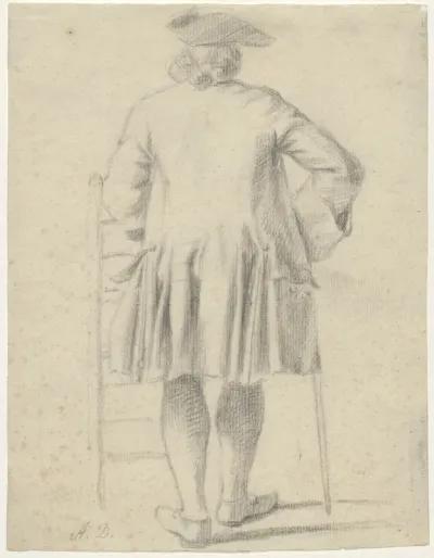 Standing man with a cane, seen from behind