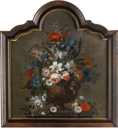 Still life of flowers in an urn on a pedestal