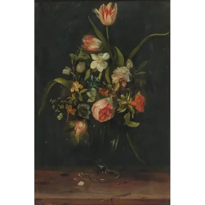Still life of roses, tulips, narcissus and other flowers in a glass vase