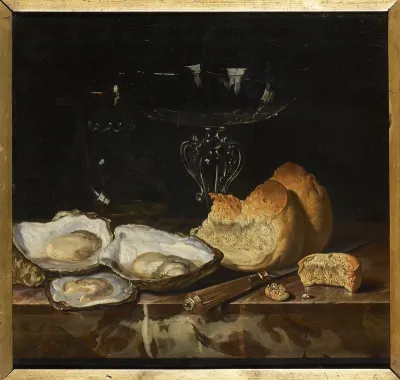 Still life with a glass tazza, bread, oysters and a knife