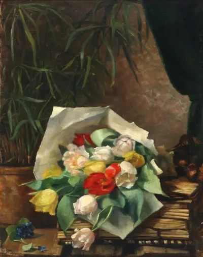 Still-life with colourful tulips on a table.