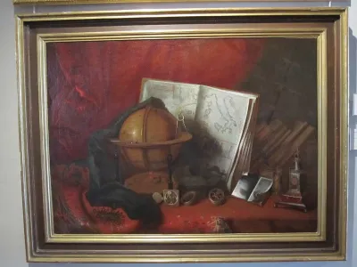 Still life with earth globe and map of Italy