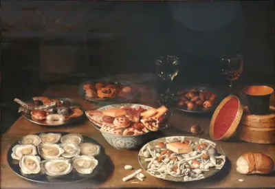 Stilleven met oesters, suikerwerk en glazen op een tafel