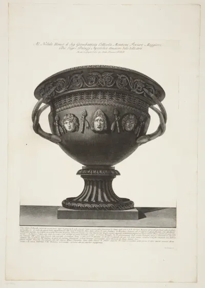 Stor vase af basalt, udsmykket med masker