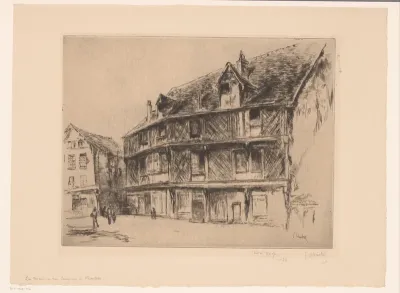 Straat met huizen en wandelaars in Chartres