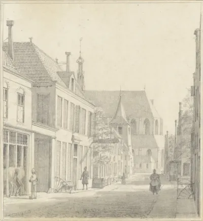 Straat te Alkmaar met de Grote kerk in het verschiet