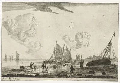 Strand met een op het zand getrokken zeilschip