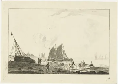 Strand met een op het zand getrokken zeilschip