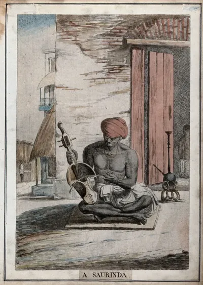 Street scene with musician playing a saurinda, a type of violin, Calcutta, West Bengal