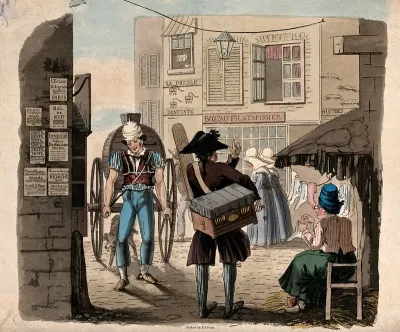 Street vendors and shops in a street in Paris