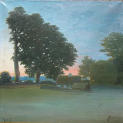 Sunset over landscape with farmhouse.