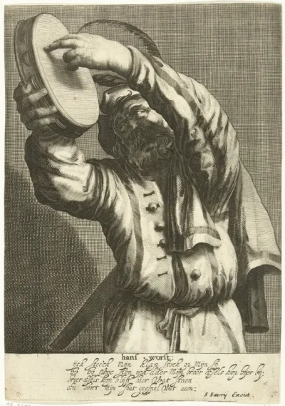 Tamboerijn spelende man