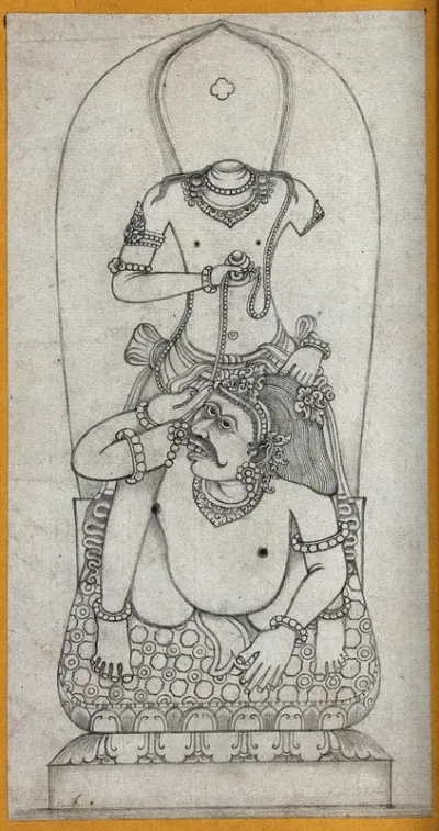 Temple sculpture: a headless figure standing over a crouching man