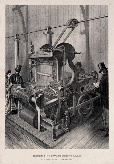 Textiles: a mechanical carpet loom, three-quarter view, with spectators