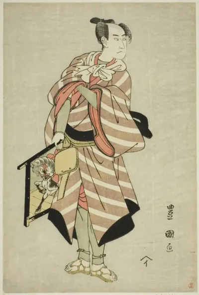 The actor Sawamura Sojuro III as the packhorse-man Muchizo in the play "Miyamairi Musubi no Kamigaki," performed at the Kiri Theater in the eleventh month, 1797