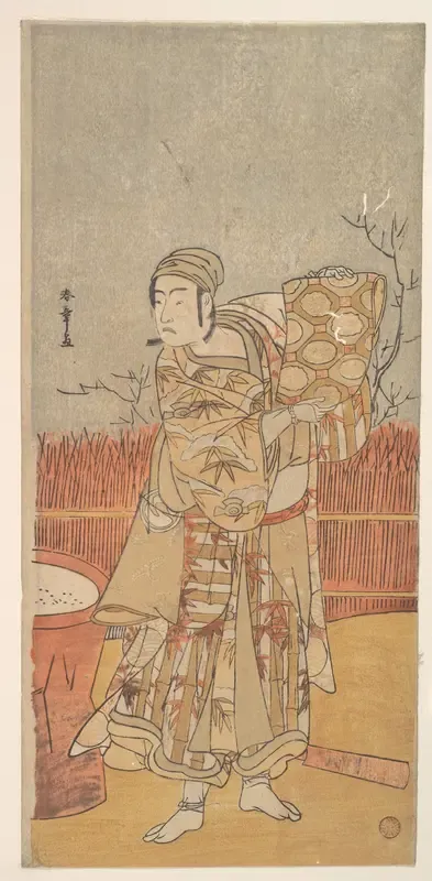 The Actor Sawamura Sojuro III Holding up a Piece of Brocade