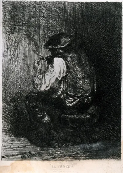 The back of a man sitting by a fire to light his pipe