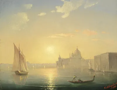 The Canal Grande with a view of Santa Maria della Salute at sunset.
