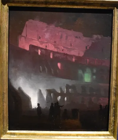The Colosseum lit with Bengalian Fire