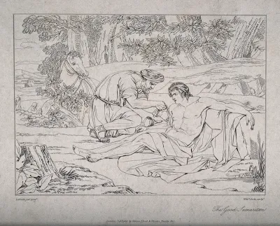 The good Samaritan tending the wounds of a beaten robbed man