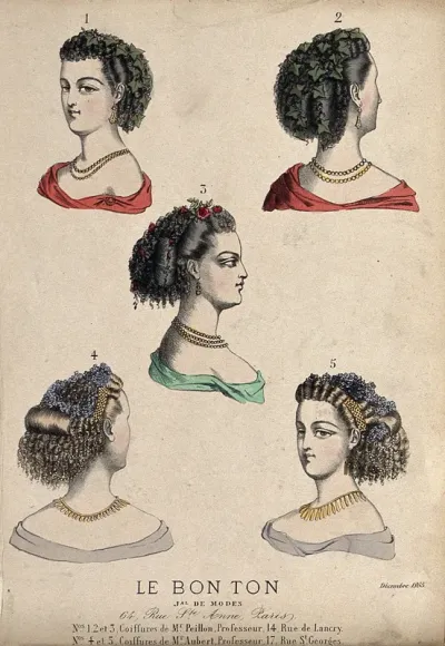 The heads and shoulders of five women with ringletted hair dressed with leaves, flowers, beads and slides