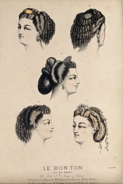 The heads of five women with ringletted hair dressed with jewellery and flowers