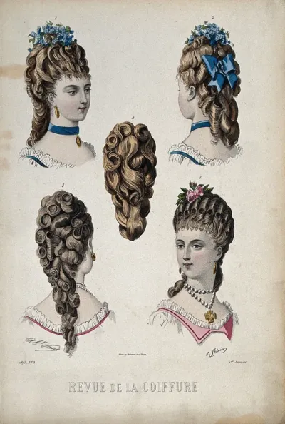 The heads of four women wearing chignons with large curls attached to their natural hair; a chignon piece