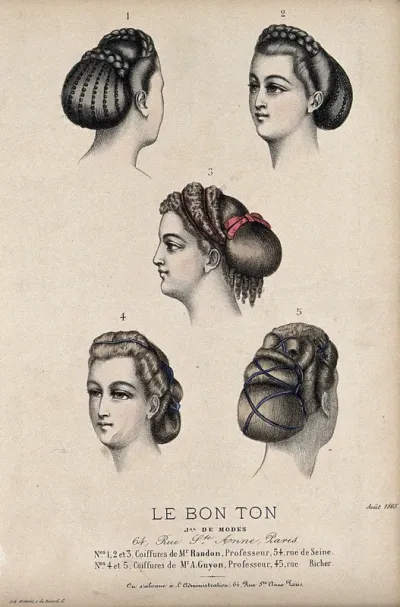 The heads of four women with plaited and ringletted hair dressed with beads and ribbons alluding to ancient Graeco-Roman hair-styles