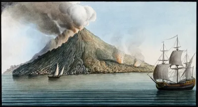 The island of Stromboli, smoke erupting from its peak